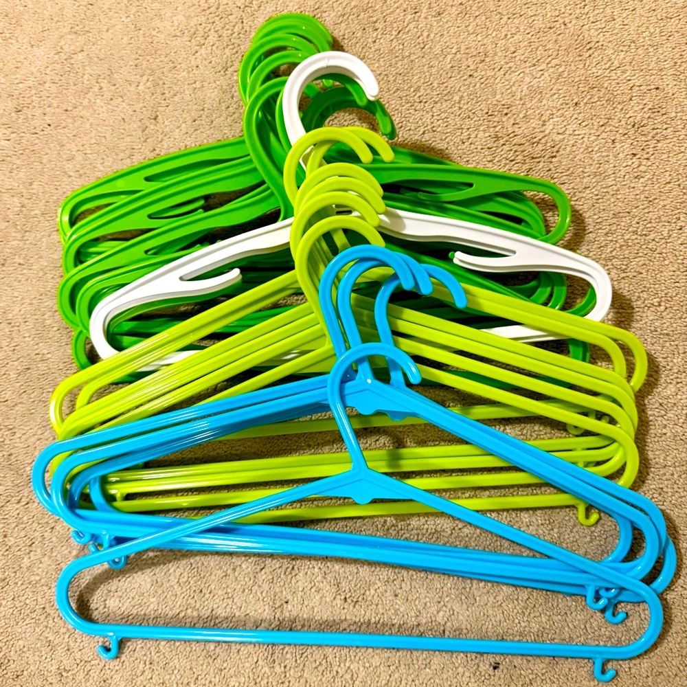24 kids plastic hangers, 13” and 14”. Excellent condition, some were not used.